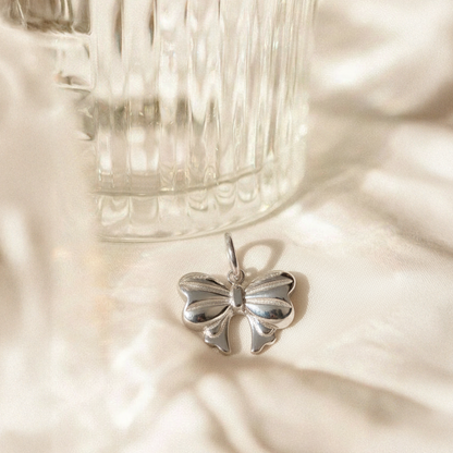 Silver Bow Pendant – Elegant Stainless Steel Ribbon Necklace Charm