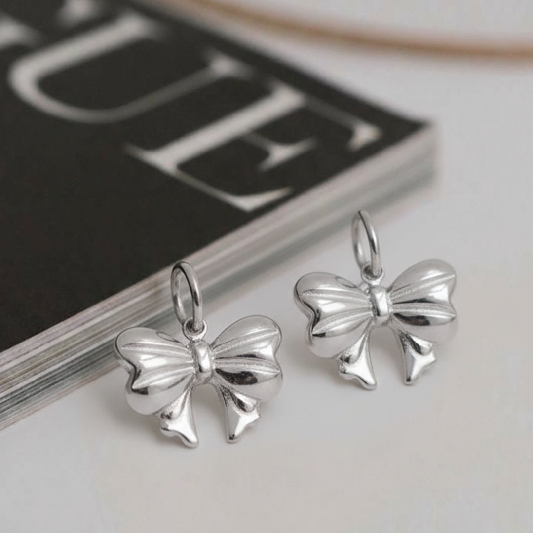 Silver Bow Pendant – Elegant Stainless Steel Ribbon Necklace Charm
